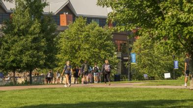 Summer campus photo with students and Davies Center