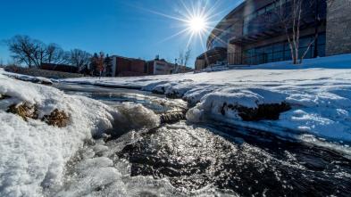 Winter campus beauty shot of Davies Center and Little Niagra.