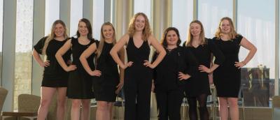 Students standing in a pyramid formation