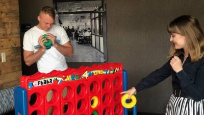 Two students playing a game