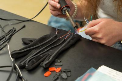 Parkinson's glove wiring being connected on a prototype