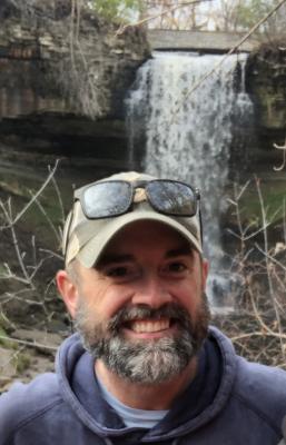 Phil Larson near a waterfall 