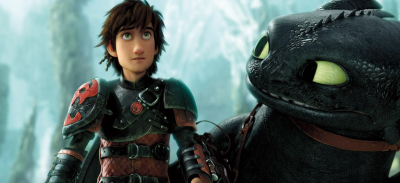 man in armor standing next to black dragon