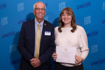 Interim Chancellor Mike Carney and Izzy Taylor