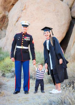 Young family, one military uniform one cap and gown