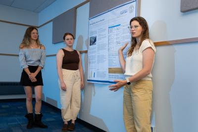 Savannah Dworshak, left, Maddelyn Webster and Emmalyn Pothen discuss psychiatric advance directives research.