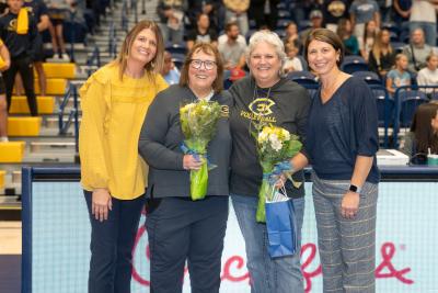 20250919 UWEC volleyball court dedication for Lisa Herb and Clare Hohman joined by Jodi Risen and Kim Wudi