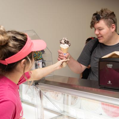 student getting ice cream cone at Olson's 