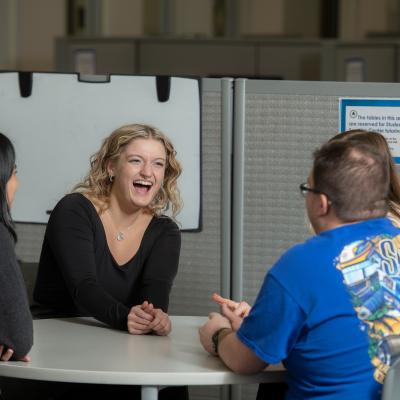 Student at a Supplemental Instruction session laughing