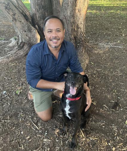 Image of Bobby Lith with his dog, Louie.