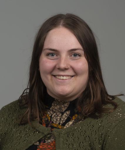 Woman facing camera for a professional headshot