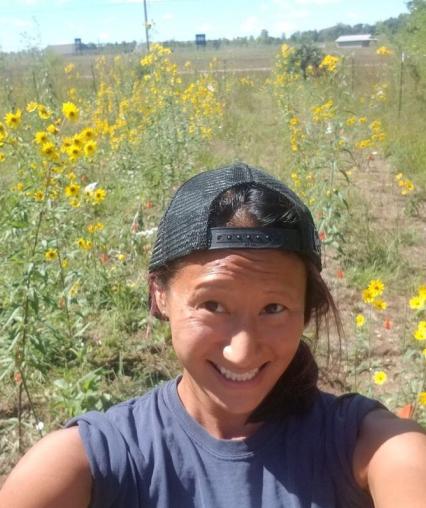 Woman in a field of sunflowers