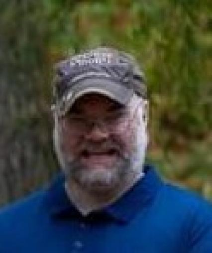 Professional portrait of Denis Setwyn