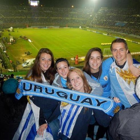 A group students watching the sport game during study aboard in Uruguay