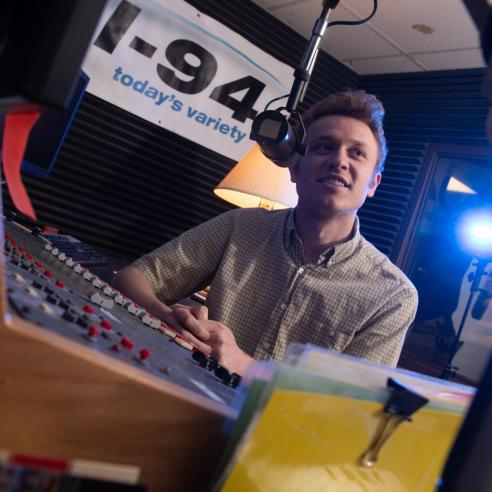 A picture of an individual in radio station