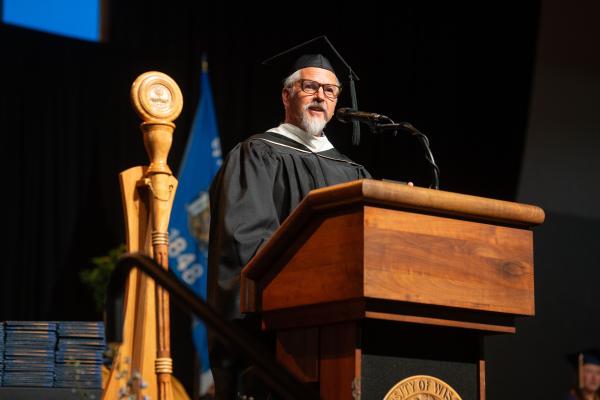 John Noltner delivering the 'Charge to the Class'