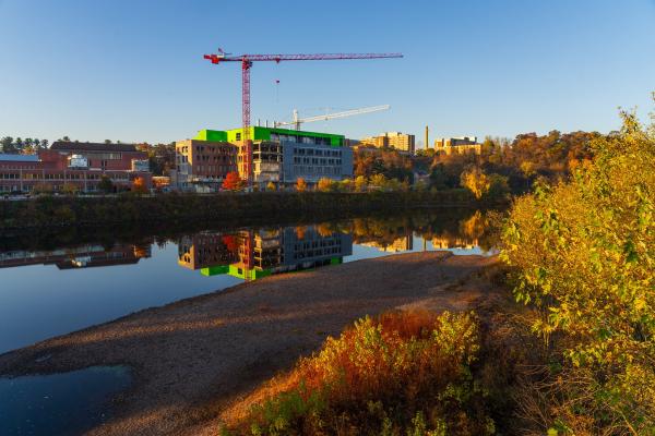 science building construction and crane from Haas shore 