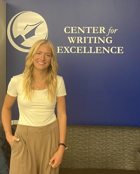 Hoffman in front of the UW-Eau Claire’s Center for Writing Excellence