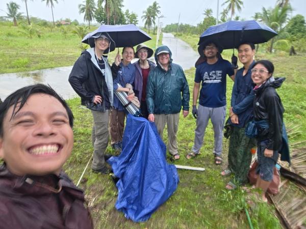 Research team in Philippines on a typical rainy day 