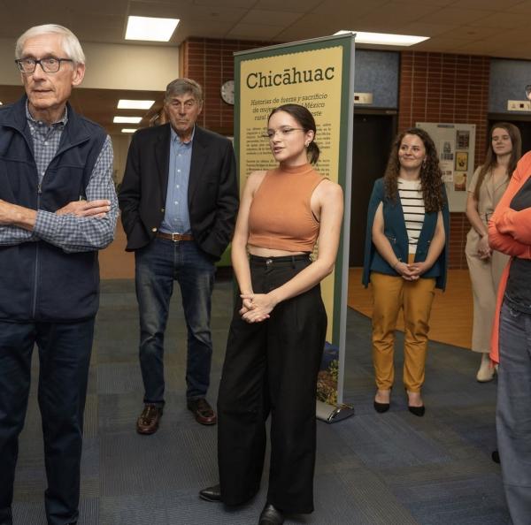 Olivia Bishop presents the Chicahuac Exhibit to Governor Tony Evers