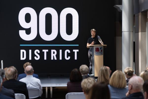 Zach Halmstad speaks during 900 District announcement