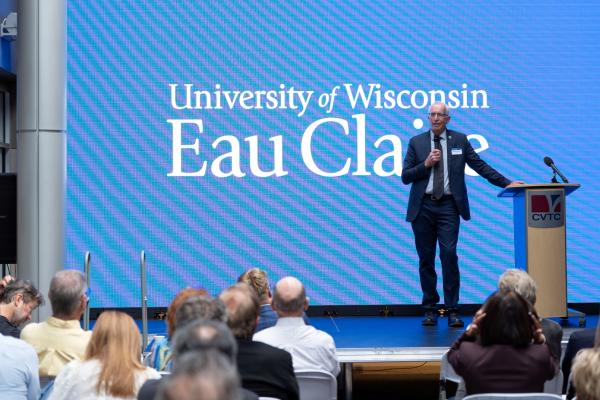 Interim Chancellor Dr. Michael J. Carney speaks at 900 District event
