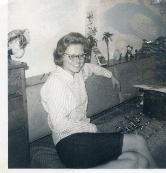Christy (Hanson) Linderholm sits in Governors Hall in 1966, where she lived for four years. Her granddaughter, new freshman Lucy Franklin, is living on the same floor of the dorm this year.
