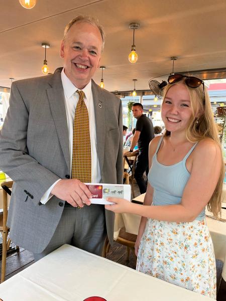 The chancellor delivered a new credit card to Blugold Katie Murphy in Italy, easing her worries after she misplaced her credit card while studying abroad this summer.