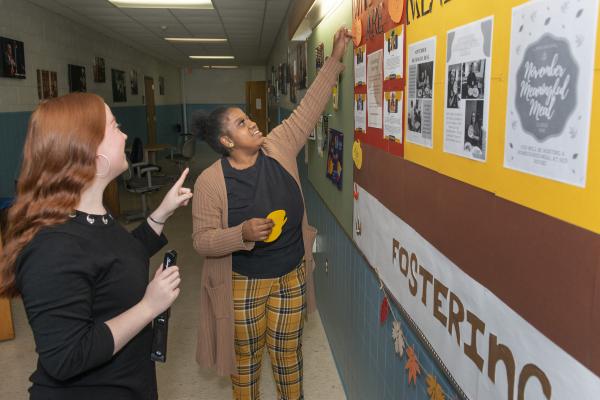 Jessica Brooks and Taz Smith are among the Blugolds helping promote the Fostering Success program. (Photo by Shane Opatz)