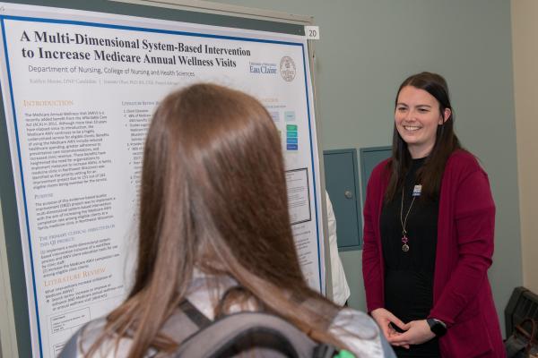 Grad student presents research poster