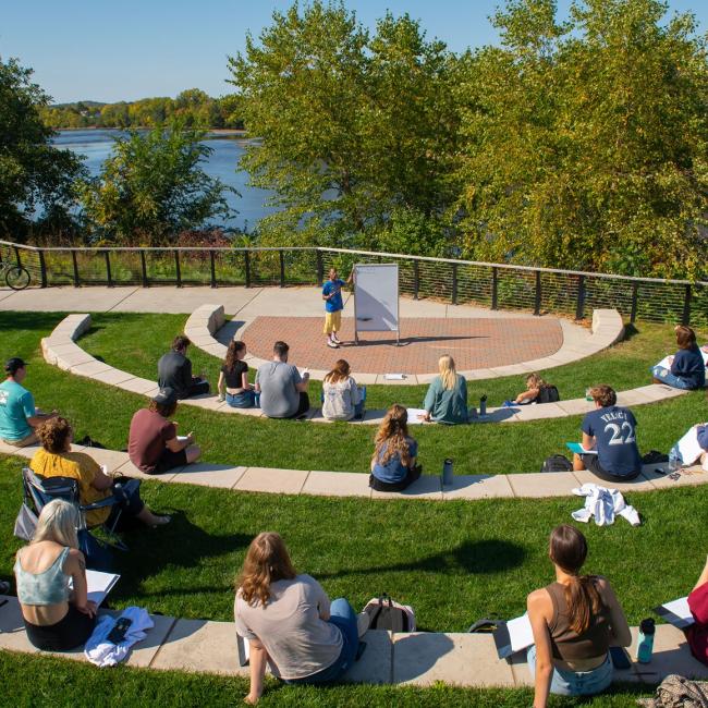 outdoor classroom full of students on a sunny day 
