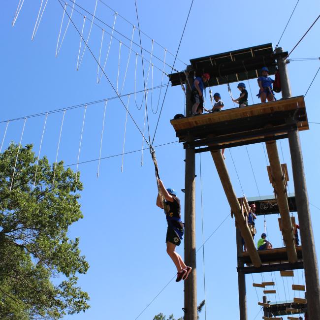 Students on high level ropes course