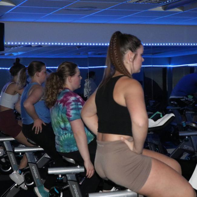 Group exercise cycling class.