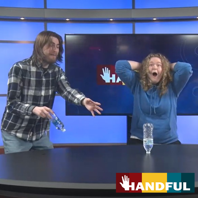 Two students perform a skit on Handful