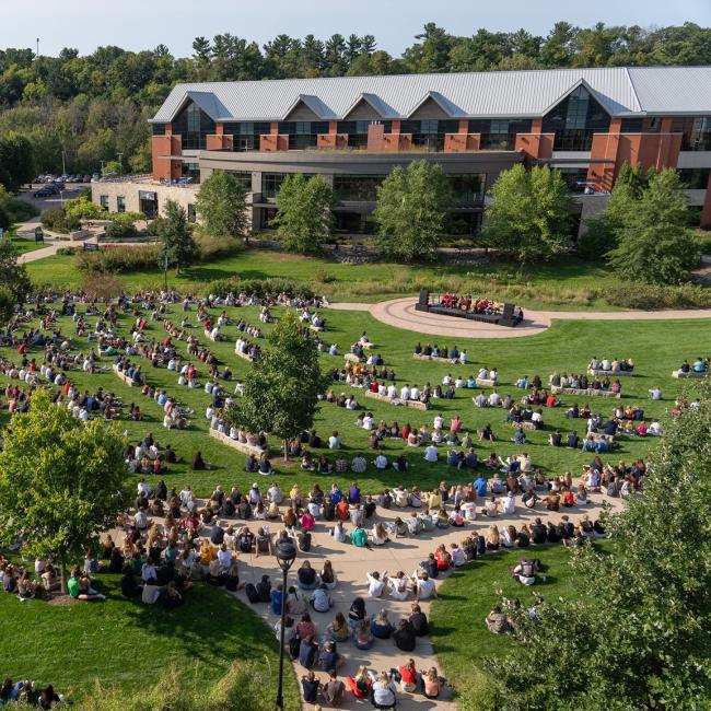 Hundreds of students gather on the campus mall during Welcome Week.