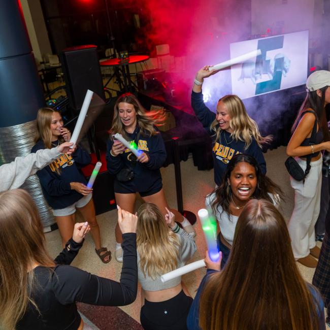 Group of students dancing at Davies Party