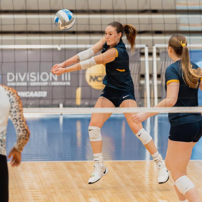 Bailey Leeke hitting volleyball 