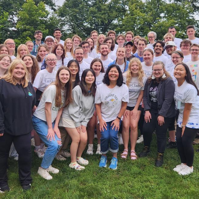 Honors students and leaders gather in matching tees for an LLC photo