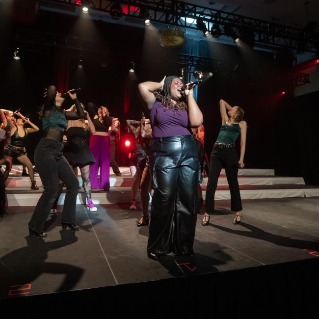 Students perform on stage for Cabaret, a student-led variety show