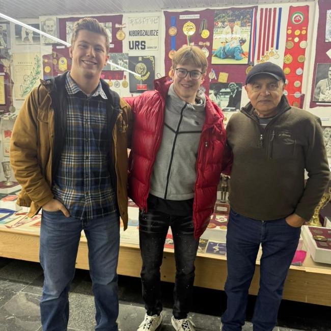McCullen Willmert stands with fellow UWEC student Danny Liakh in Georgia