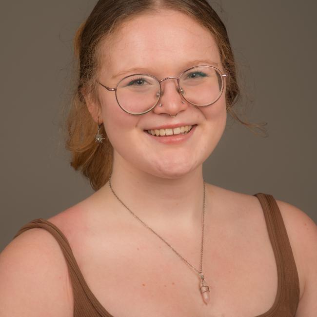young woman with glasses