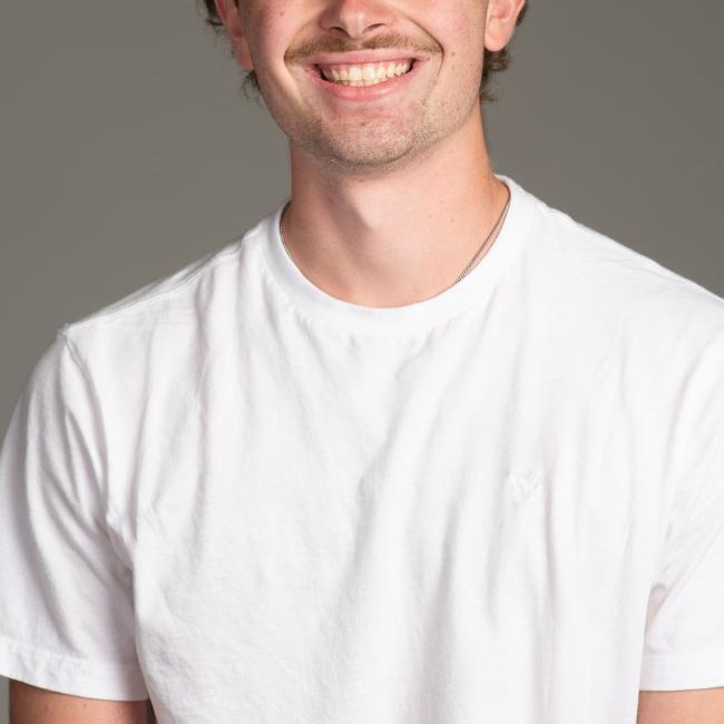 young man in white shirt