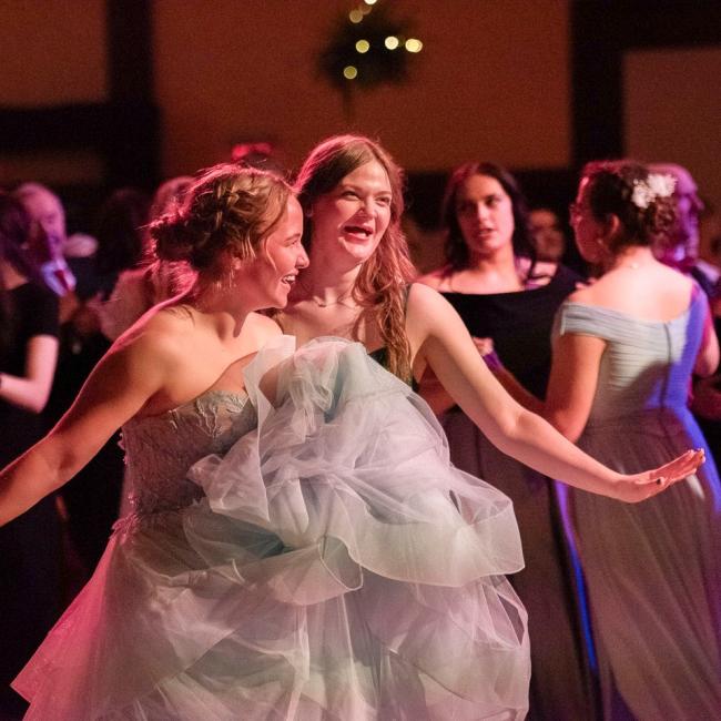 Viennese Ball attendees smile and dance during the annual event.