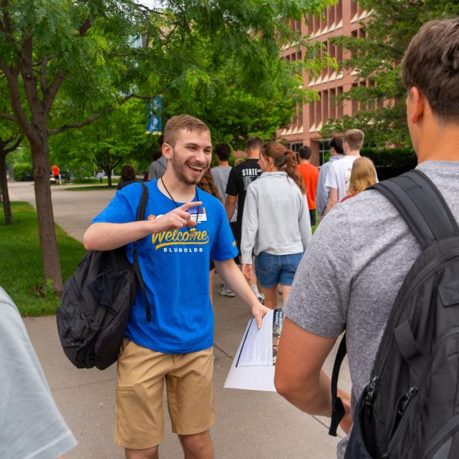 Students excitedly greet one another during Orientation.
