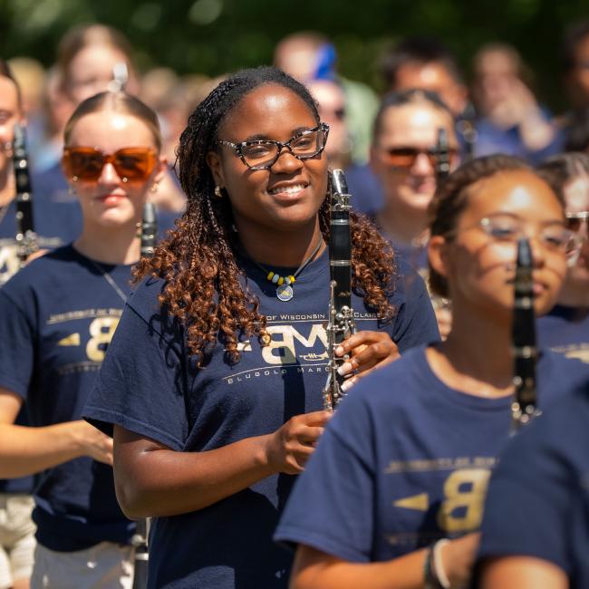 Blugold Marching Band members line up to perform.