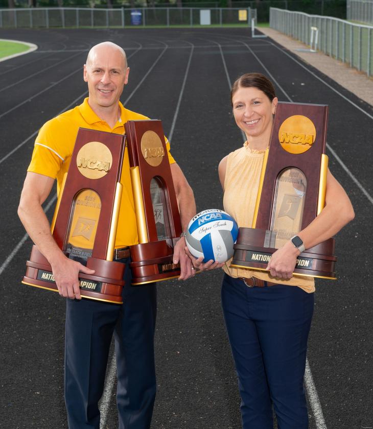Blugold track and volleyball champion coaches