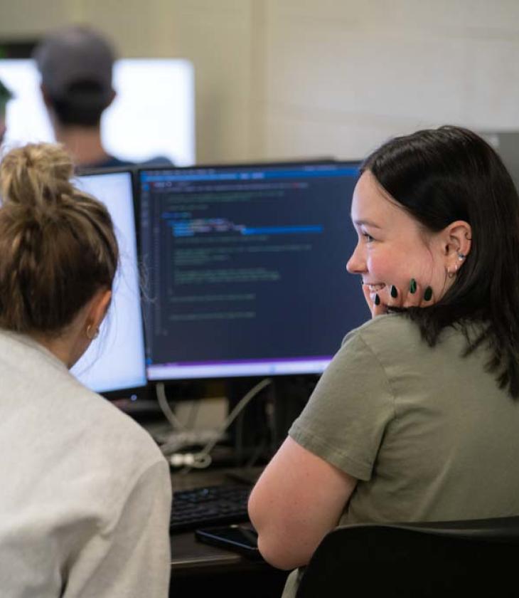 two students in computer lab