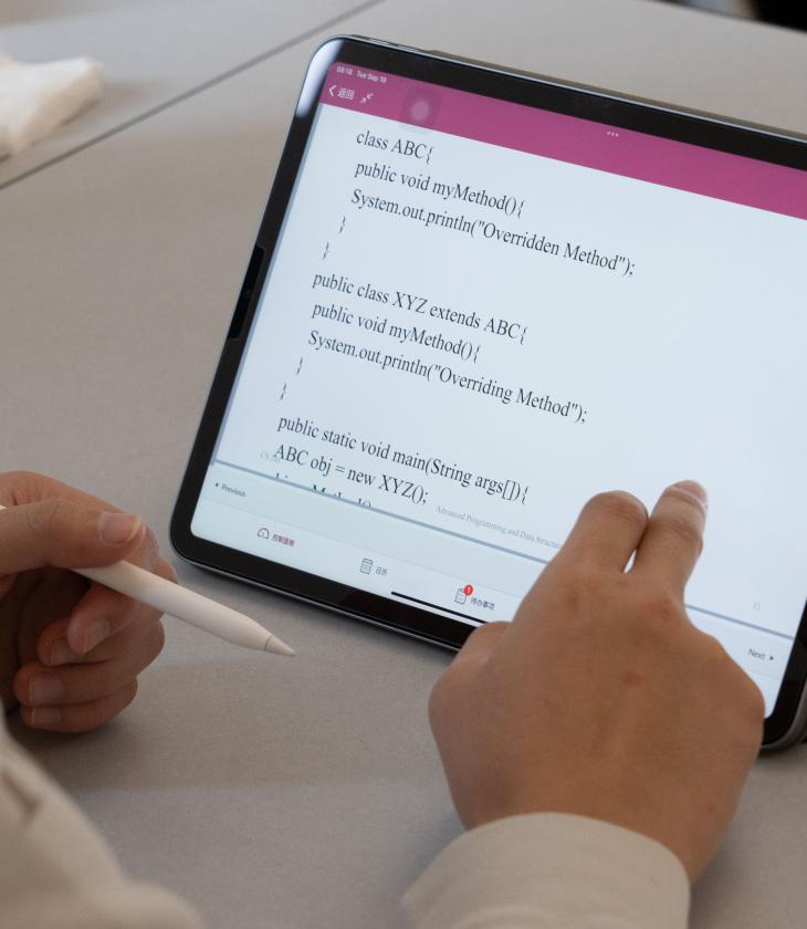 code on tablet screen