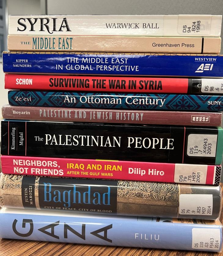 stack of text books about the Middle East