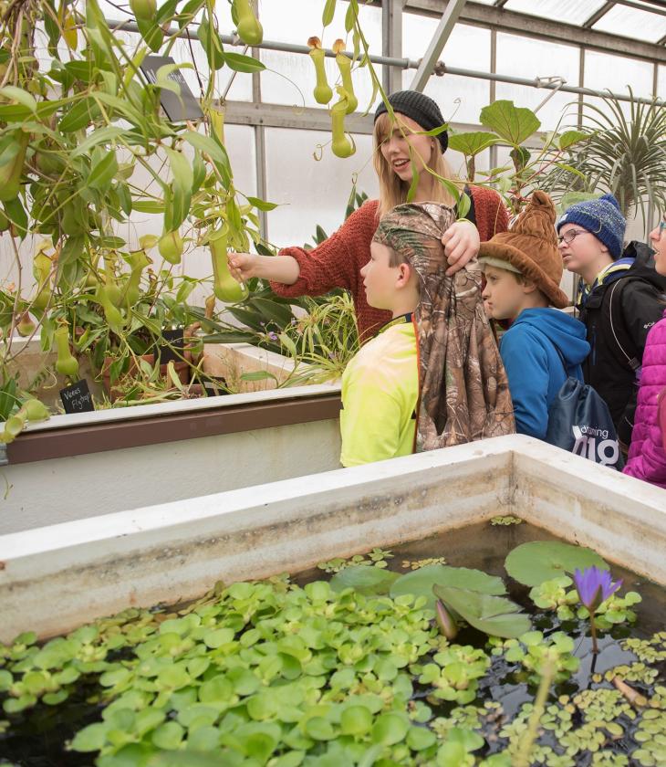 youth visitors in the greenhouse